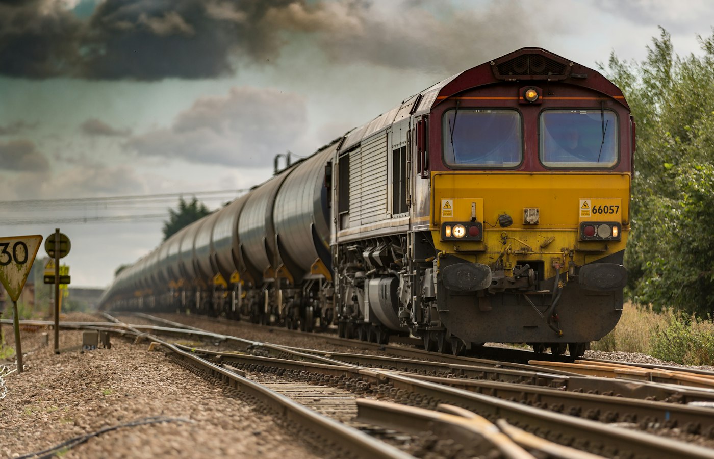 High-speed train moving through a landscape